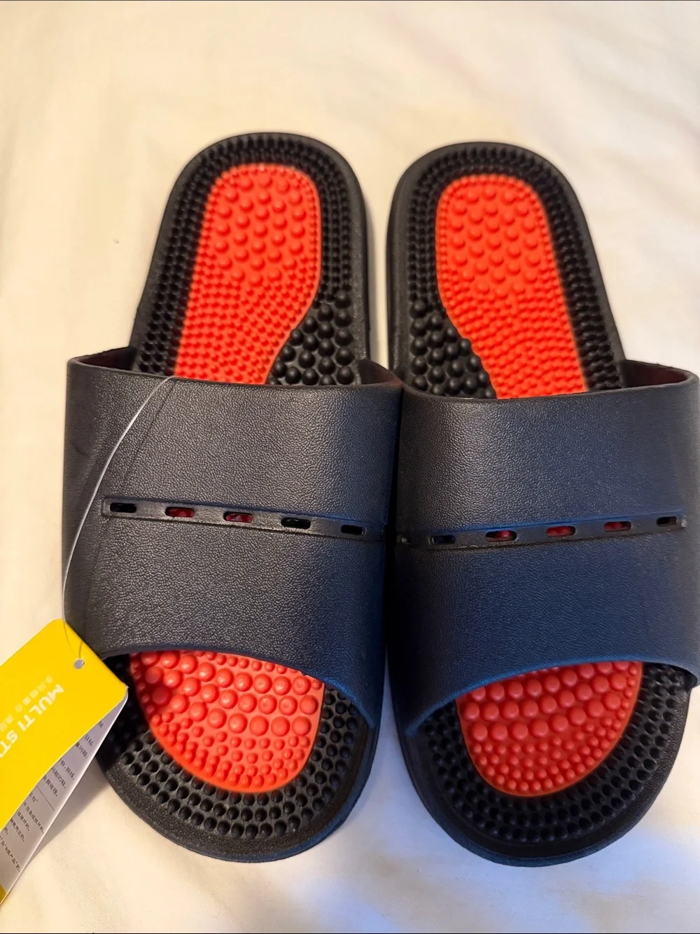 Stepprs Adult Black and Orange Massage Slide Sandals